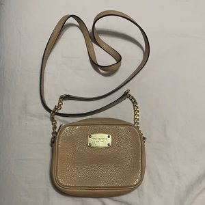 Small Michael kors cross body purse.
